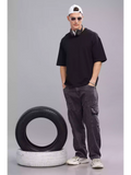 Solid Black Over sized - Sukhiaatma Unisex T-shirt - Sukhiaatma
